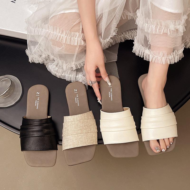 Flat heel one-word drag fashionable outer wear new summer versatile seaside casual cool slippers