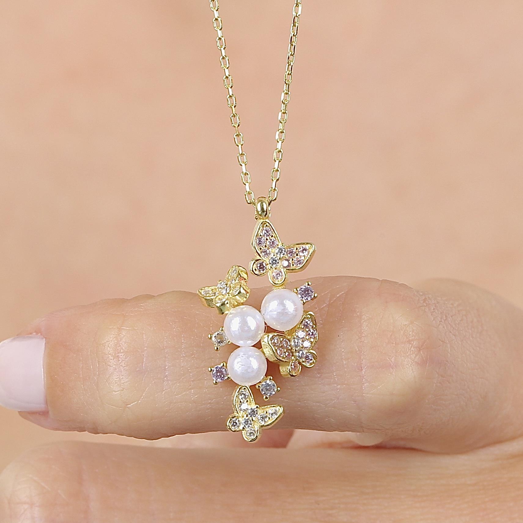 

Pink Taşlı Kelebek Valsi Gold Renk Gümüş Kolye