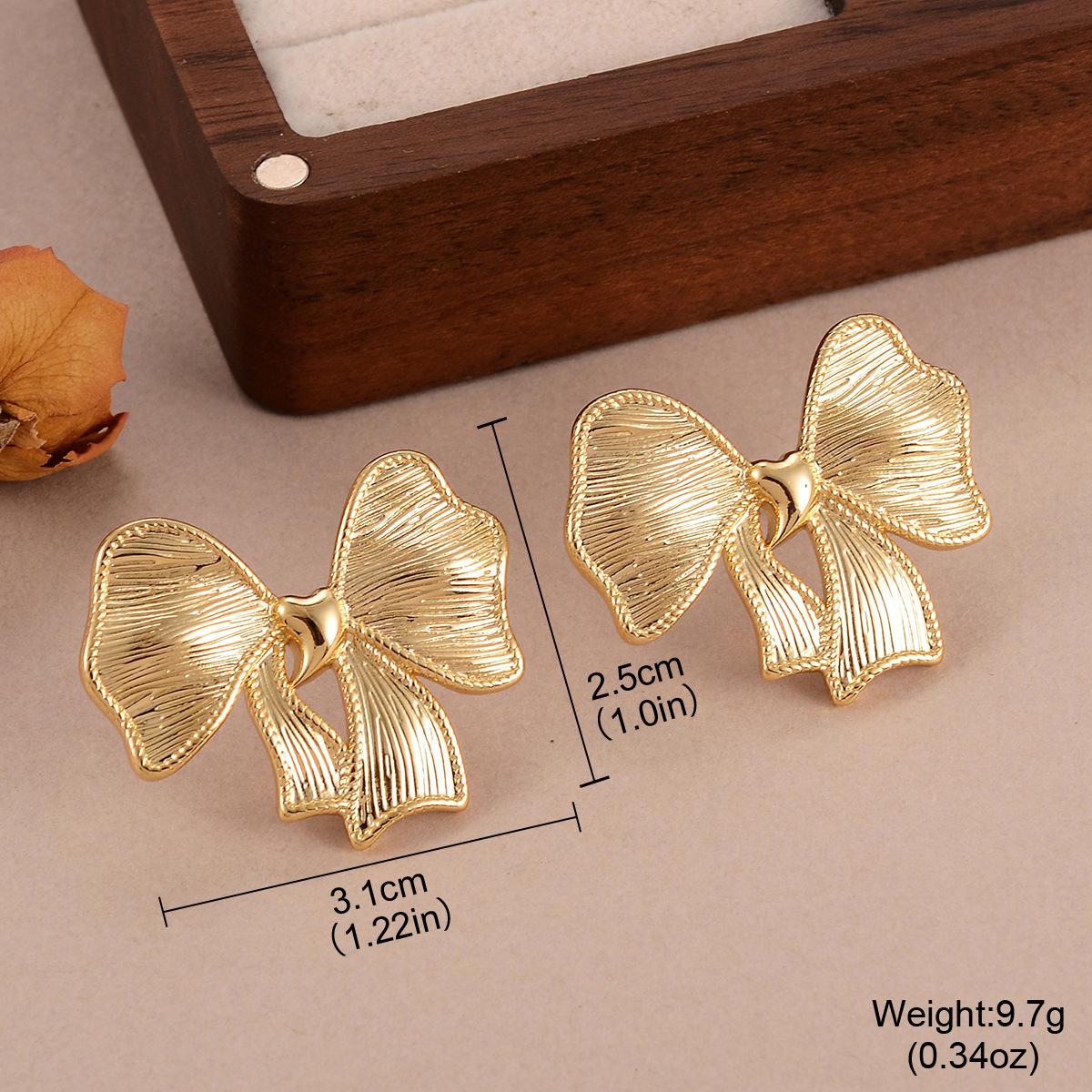 Retro bow stud earrings design sense personality versatile smooth surface high sense earrings new earrings