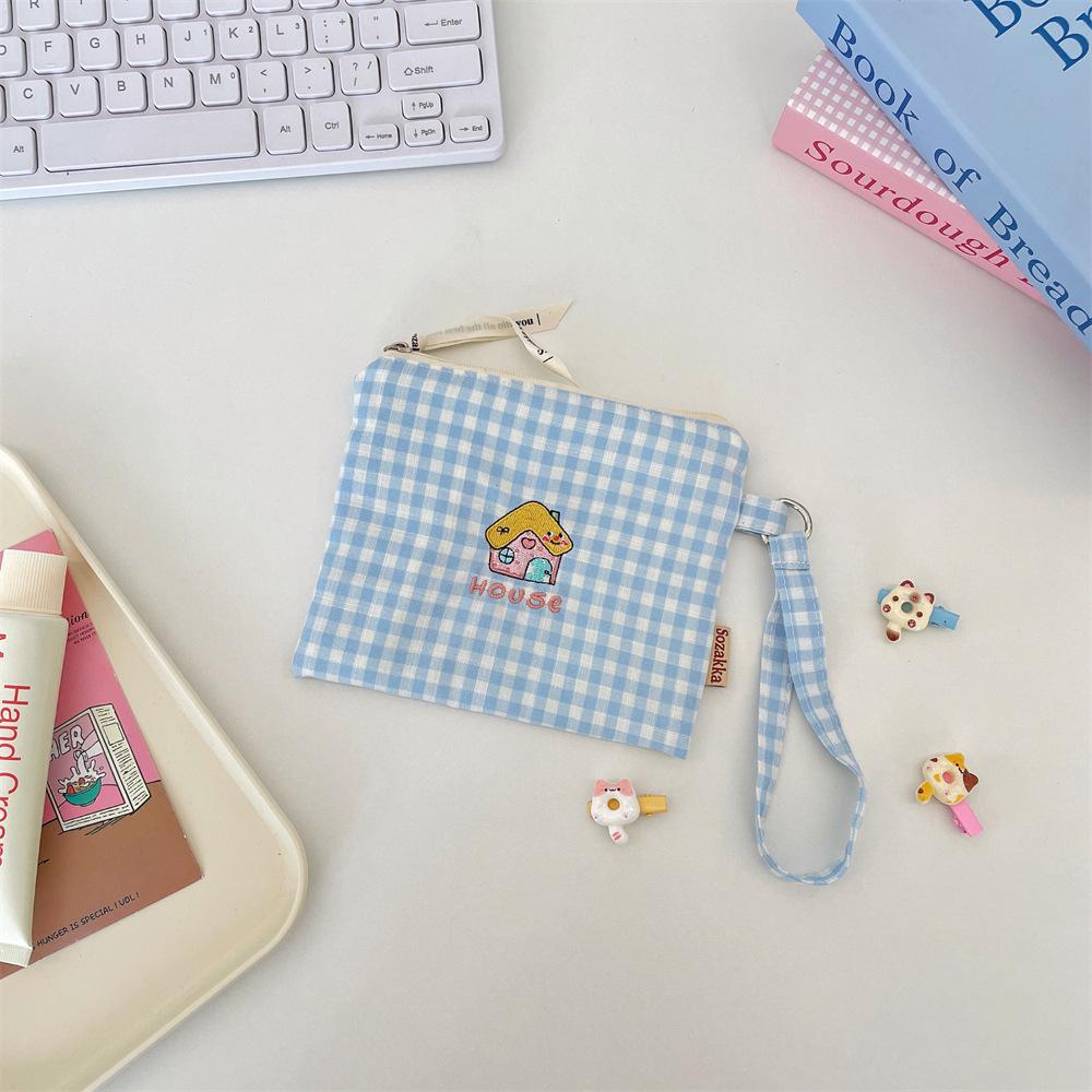 5 Cute embroidery storage bag, change bag, portable earphones, sundries, sorting bag, lipstick jewelry, coin storage.