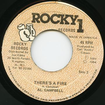 

7inch Record AL CAMPBELL Theres A Fire NONE Rocky 1 Records 1984 Jamaica Reggae Ska Dub Used