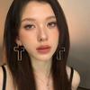 European and American Personalized Metal Line Cross Earrings Women's Niche High-end Sense Versatile Temperament Show Face Small Earrings