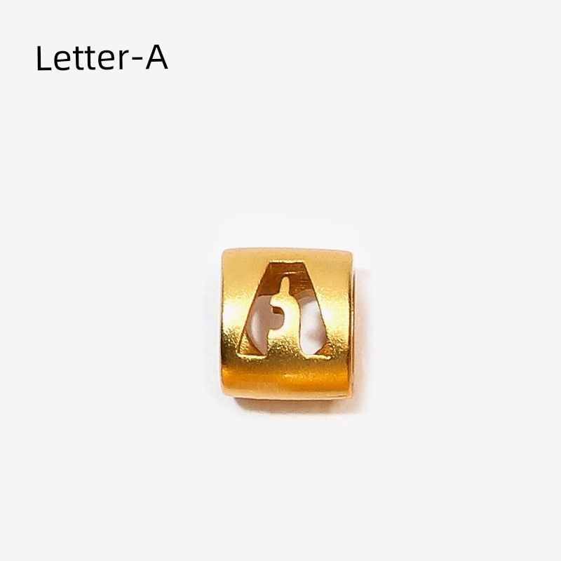 

Браслет-оберег из нити с буквами и бусинами под старинное золото Letter A