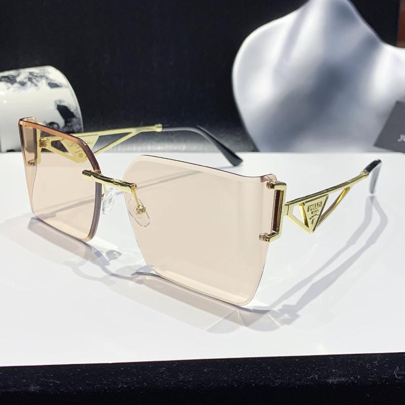 

Latest Frameless Edge Curved High-end Sense Womens Sun Glasses Glasses Durable Metal Metal Inverted Triangle Decorative Eyeglasses Men 90310