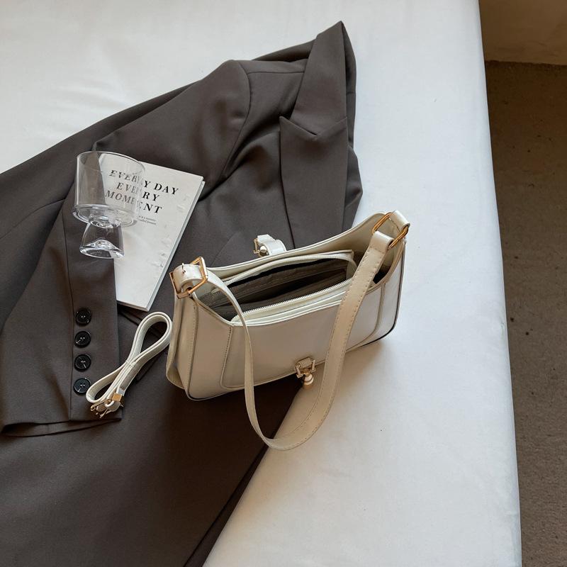 Early spring new fashion niche design small lock armpit bag shoulder crossbody trendy women's bag