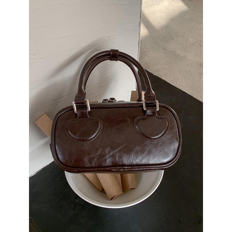 

New contrasting color splicing mobile phone bag women s retro small handbag bag niche styling handbag кофейный