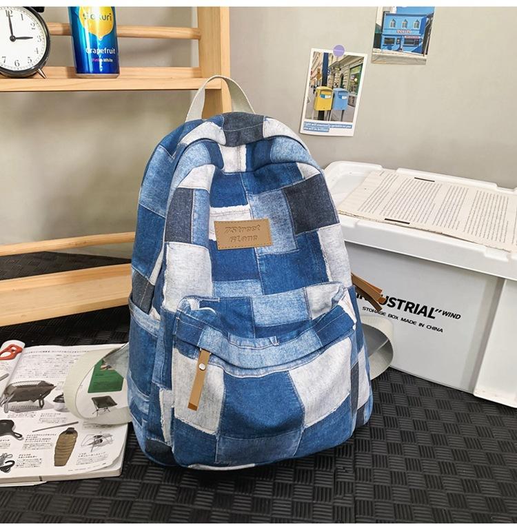 Large-capacity new middle school schoolbag, junior high school backpack, boys' casual versatile college student computer bag, women