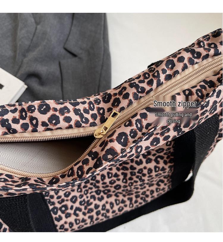 Leopard Print Canvas Tote: Large Capacity Autumn Shoulder Bag for Women, Versatile for College and Commute.