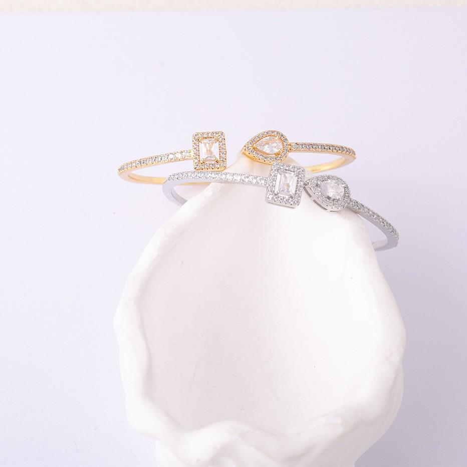 18K Gold-Plated Zirconia Bangle Bracelet with Adjustable Open Design for Women - Available In Gold and Silver.