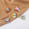 Gold Striking Plated Punk Skull Brooch Featuring Beautiful Rose Design For Distinctive Fashion Appeal