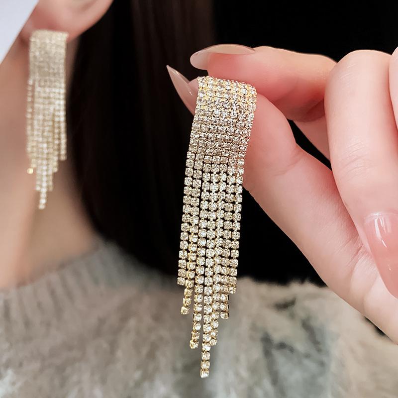 

Серьги-гвоздики из настоящего золота с гальваническим покрытием из серебра, инкрустированные горным хрусталем, дуговые серьги с кисточками, легкие роскошные серьги высокого качества, изысканные модные серьги для женщин