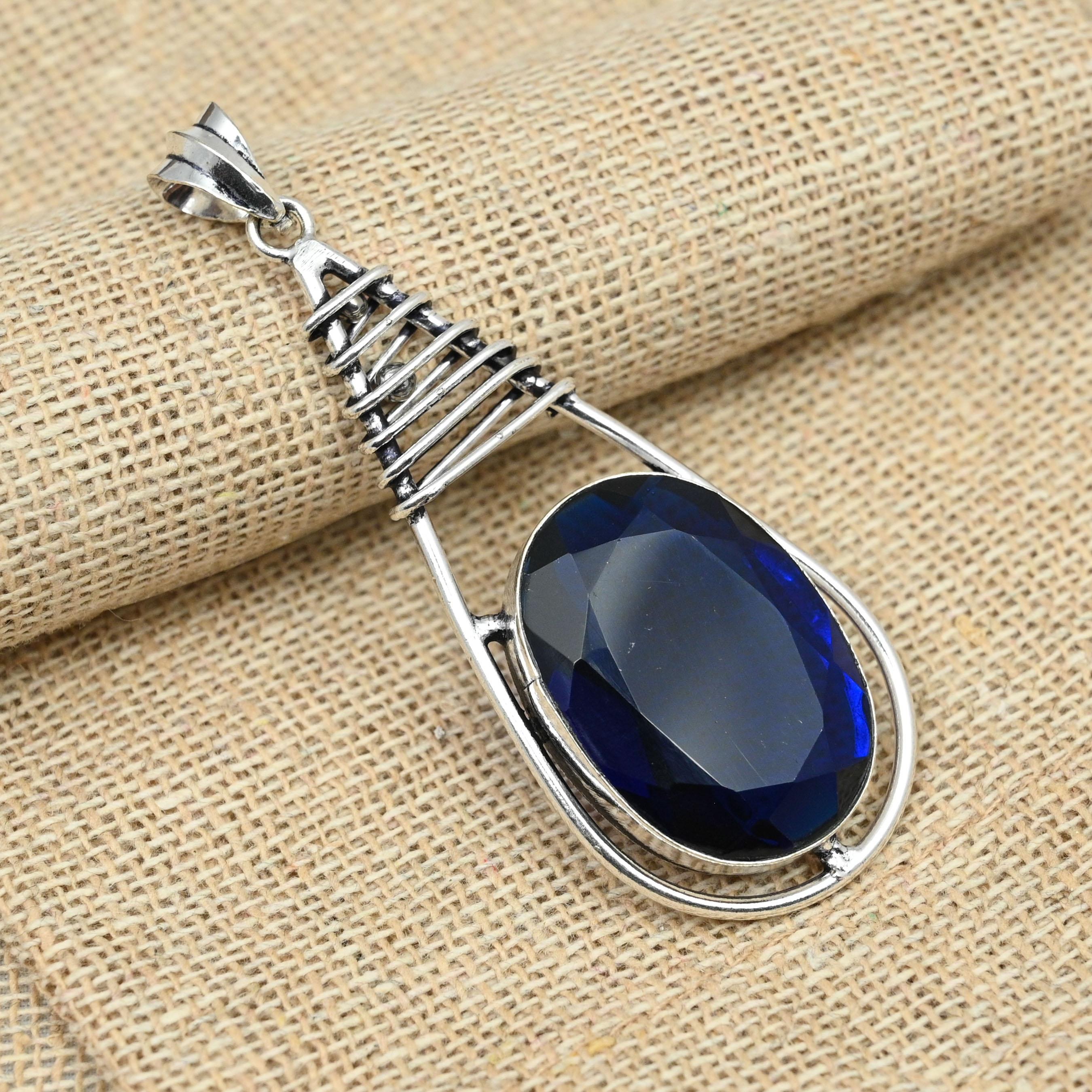 

Созданный в лаборатории синий сапфир драгоценный камень стерлингового серебра 925 пробы ручной работы кулон овальной формы для подарка 2.75 Inches синий