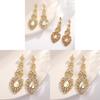 Vintage Water Drop Earrings For Women With Gold Finish For Evening Wear