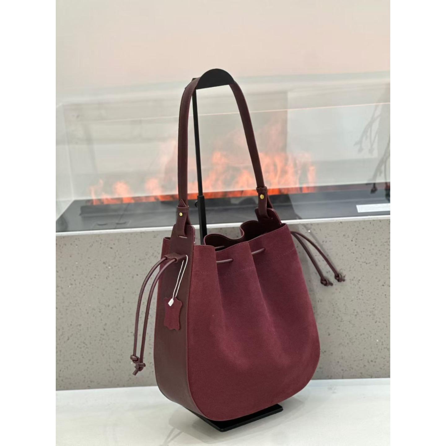

Cross Border High-quality Frosted Cowhide Tote Bag Genuine Leather Women s Fashionable Versatile Drawstring Crossbody Bucket Length 29, Bottom width 10, Height 30cm
