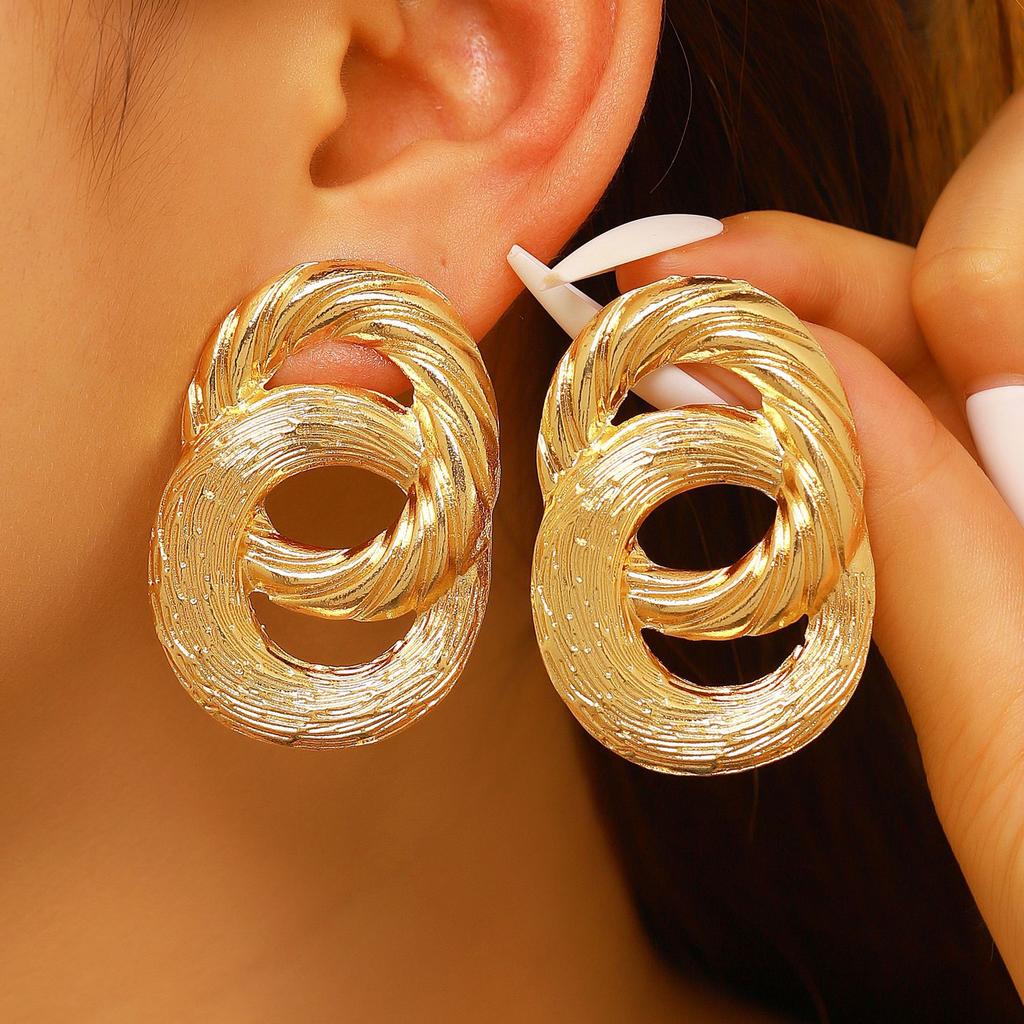 Fashionable Geometric Twisted and Round Gold Statement Earrings for Women… More