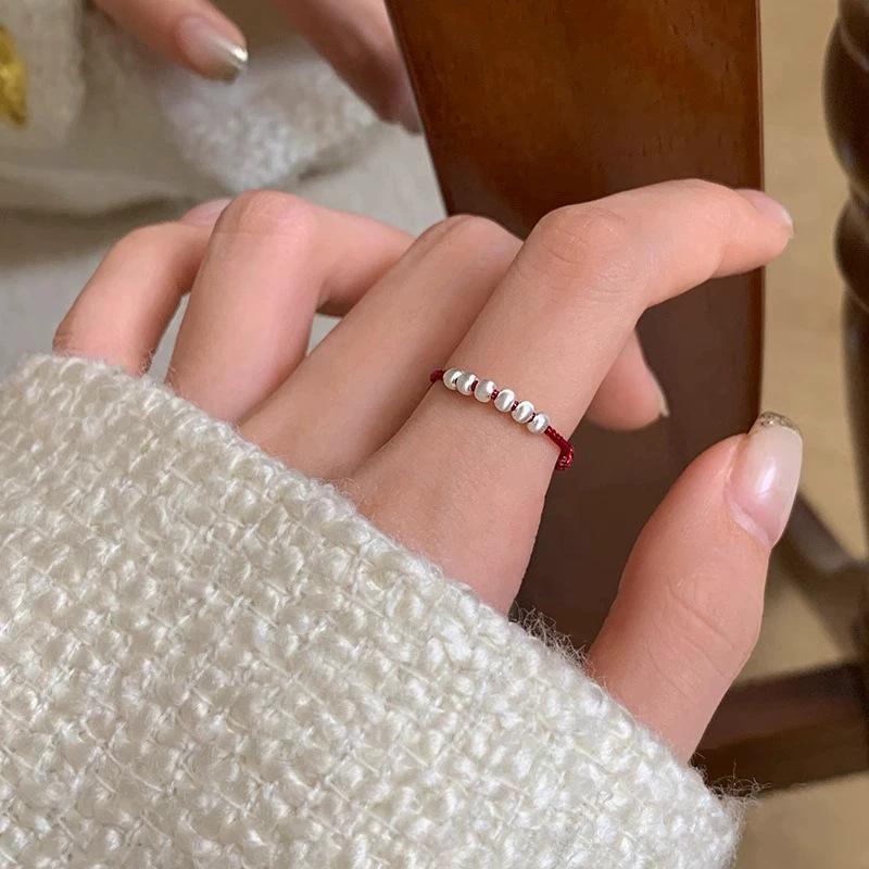 Trendy Ethnic Red String Woven Bead Ring for Women - Simple, Fashionable, Versatile Chinese Style Finger Accessory.