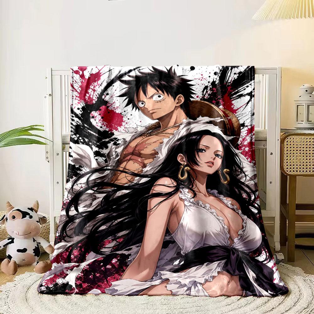 Dynamic duo with torn clothing against bold black and red splatter backdrop. for all seasons blanket lunch break throw gift 80cm x 120cm