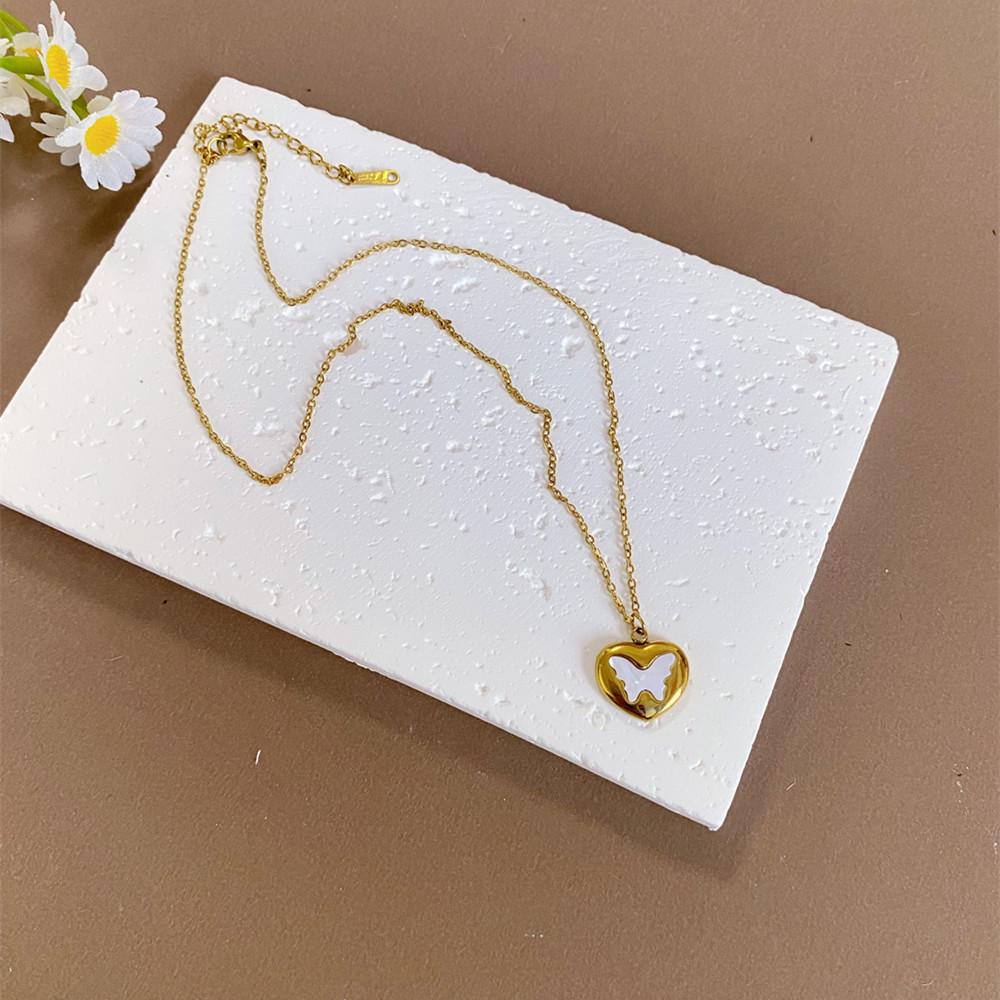 

Titanium Steel Gold Heart Butterfly Necklace Earrings - Retro Style, Color-Preserving Design