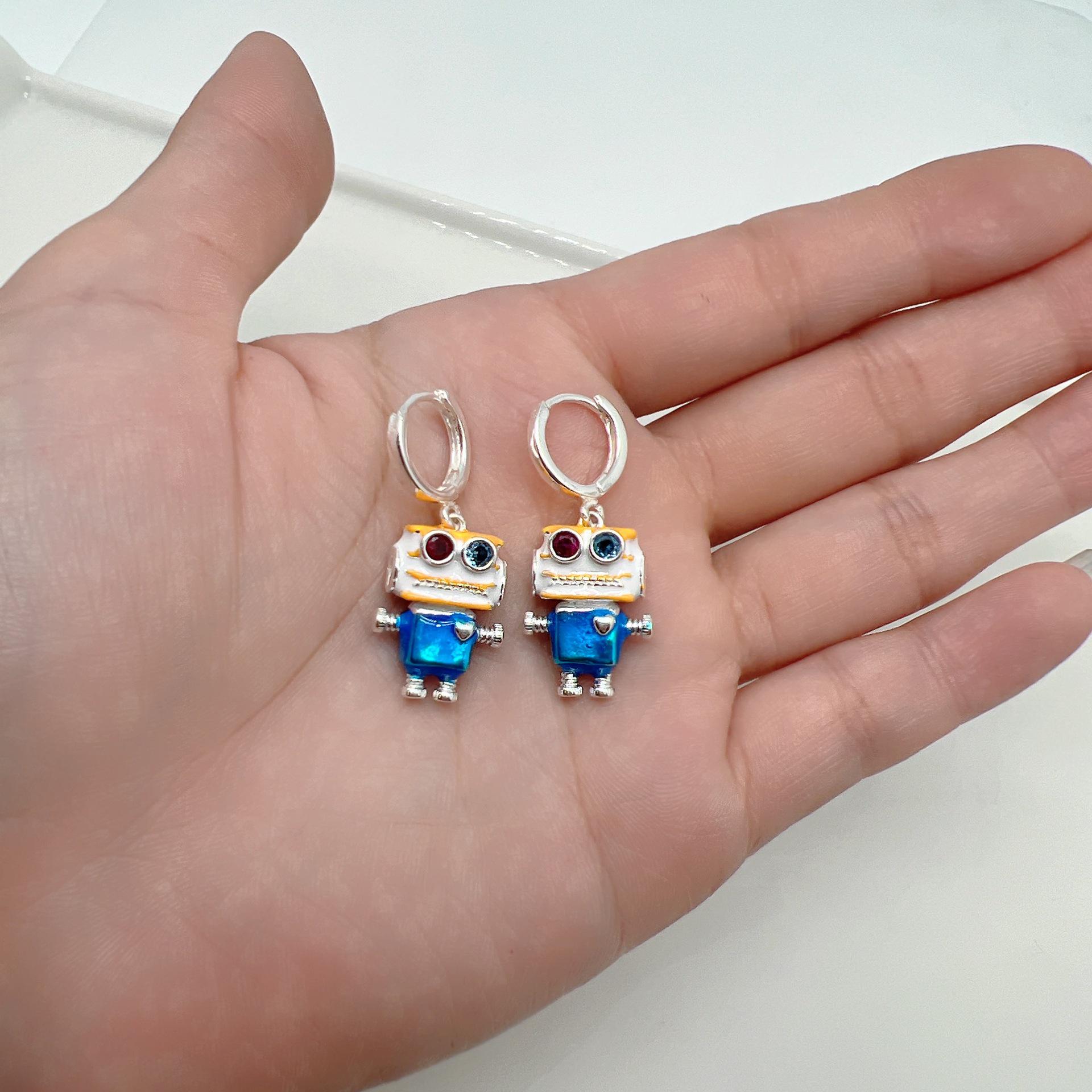 

Colorful Cartoon Robot Earrings with Drip Oil Inlaid Diamonds - Trendy and Stylish Ear Cuffs for Women