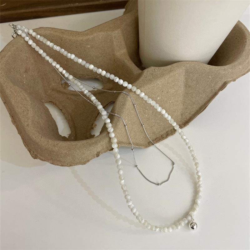 S925 Sterling Silver Double Layer White Shell Round Ball Necklace - Minimalist High-End Korean Spring/Summer Design.