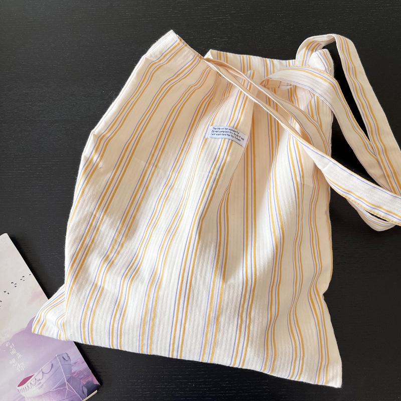 

Spring and summer new French striped temperament orange green striped retro contrasting thin shoulder bag canvas bag