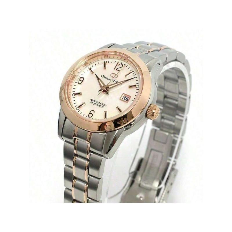 Oriental Automatic Mechanical Watch from featuring dial, mother-of-pearl dial Oriental mother-of-pearl numeral markers/stainless steel GOLD-TONE