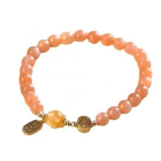Sunstone bracelet for women, symbolizing the rising sun, love, and radiant light, with fragrant ash and glass beads