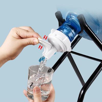 Distributeur d'eau minérale pure inversé avec support.