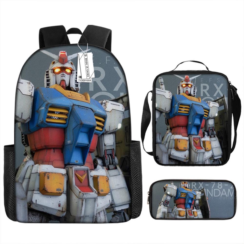 Gundam Mecha Schultasche Jungen und Grundschüler Ultraleichter Rückenschutz Rucksack Jungen Animation Kinderrucksack Dreiteiliges Set