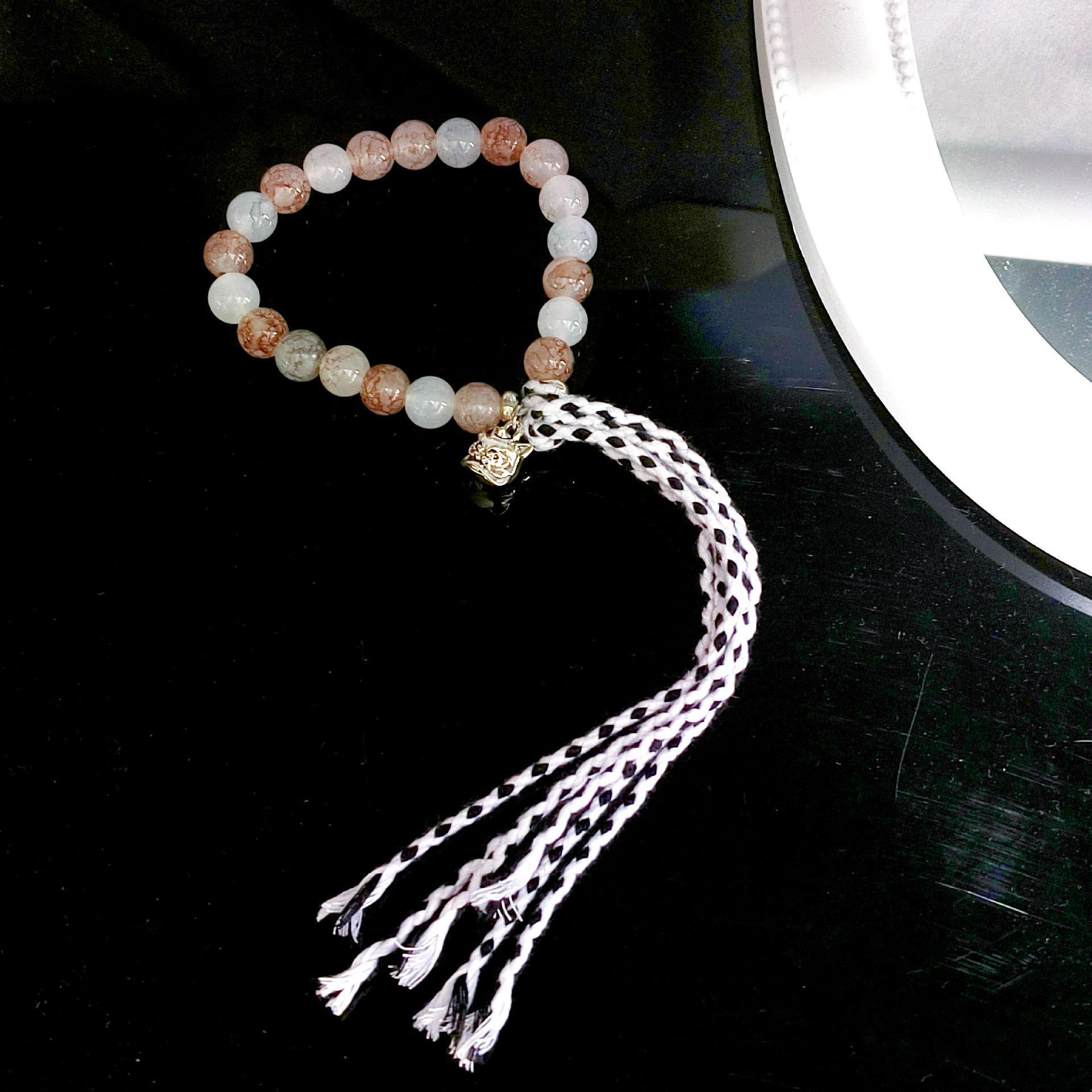 

Новый китайский многослойный ретро-браслет из натурального камня с бусинами - нишевый женский дизайн, элитный национальный стиль. Tassel lion dance