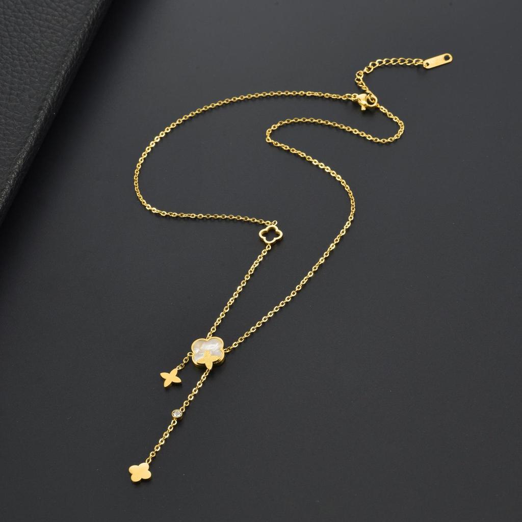 Elegant Gold Titanium Steel Women's Necklace with White Shell, Zircon, and Monogram Tassel