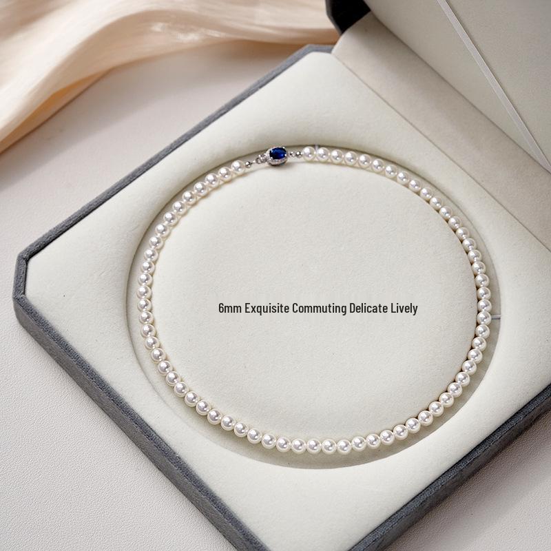 Natural Mother-of-Pearl Necklace with 925 Silver Sapphire Clasp, High Luster Shell Pearls, and Australian White Pearls.