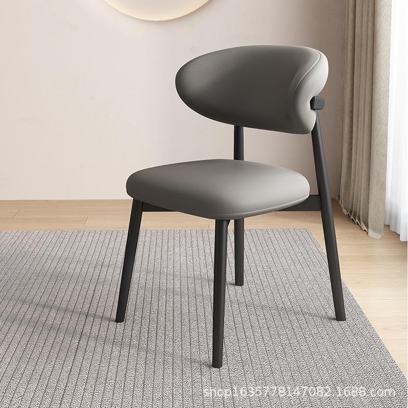 Nordic Modern Minimalist Solid Wood Dining Chair with Soft Pack Backrest - Comfortable Light Luxury Ram's Horn Design for Home, Restaurant, and Hotel.