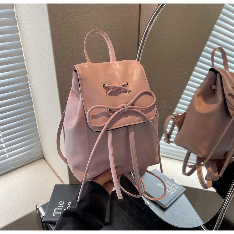 

Korean version bow double shoulder small bag women 2025 new trendy Korean backpack cute portable shoulder bag schoolbag