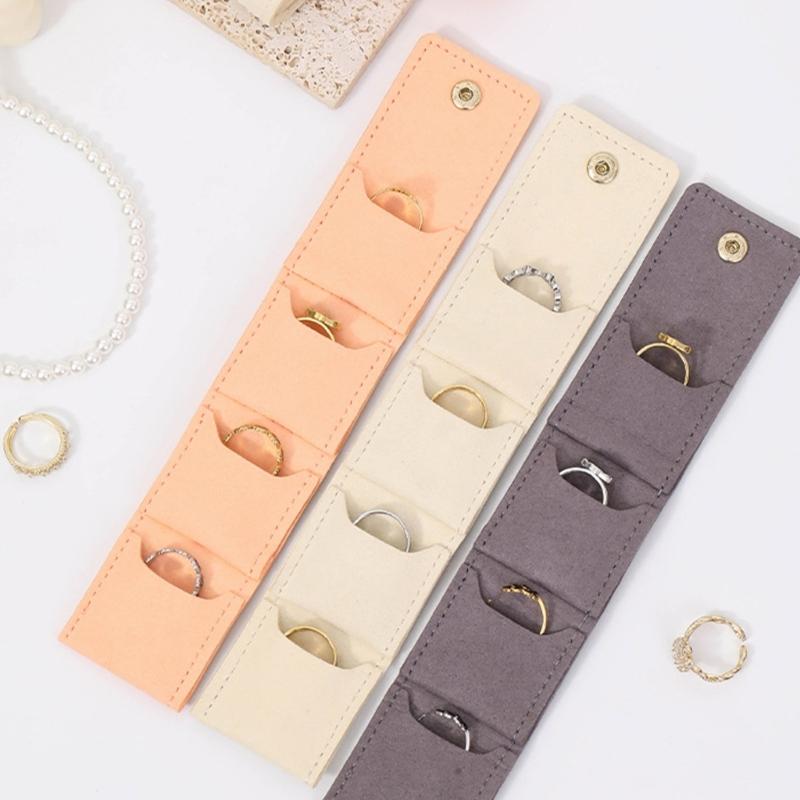 Compact Travel Jewelry Storage Case with a Folding Pouch Design, Separate Storage Spaces, and Snap-Fastened Flap for Small Jewelry