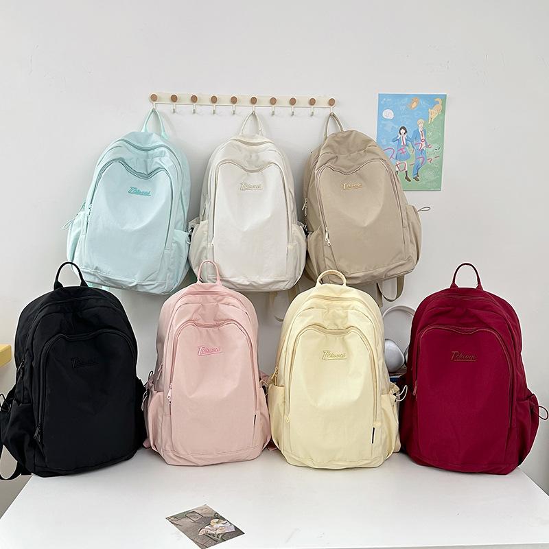 Korean version ins style solid color small fresh schoolbag women, junior high school girls, high school students backpack light travel backpack
