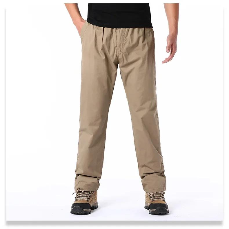 Wiosenne jesienne modne spodnie casualowe dla mężczyzn bawełniane spodnie cargo w jednolitym kolorze z elastyczną talią proste nogawki streetwear męskie spodnie joggers