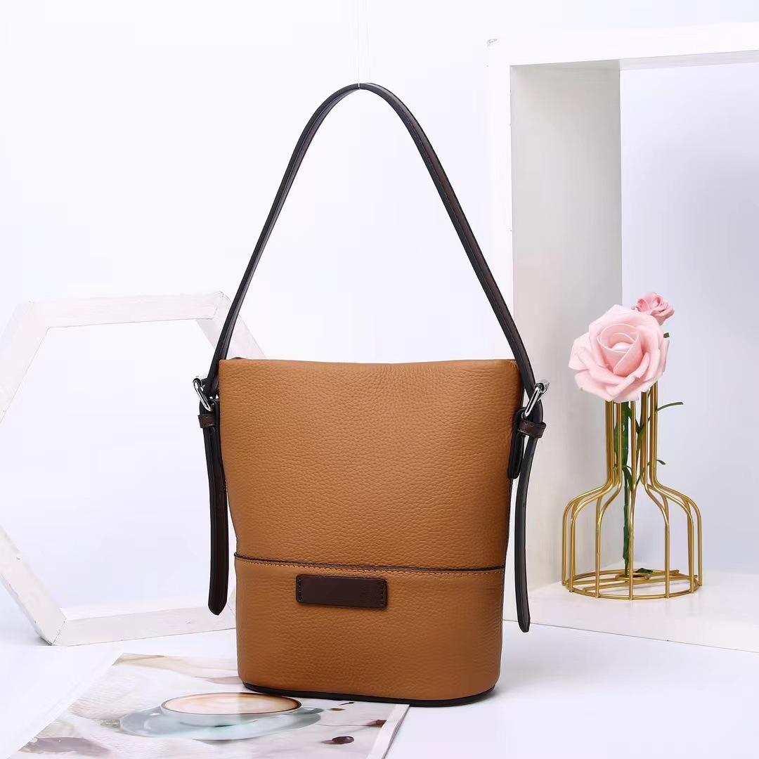 

Новая модная универсальная кожаная сумка под мышкой вертикальная простая из коровьей кожи togo женская сумка через плечо 16*8*19CM коричневый