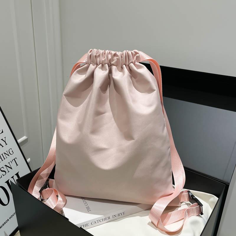 Schoolbag solid color Korean version drawstring retro versatile large capacity backpack female niche simple fashion personalized backpack