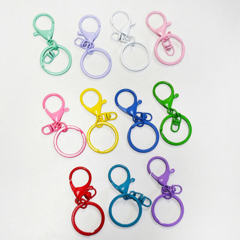 A wealth of materials for making keychains, including a colorful lobster hook O-ring.