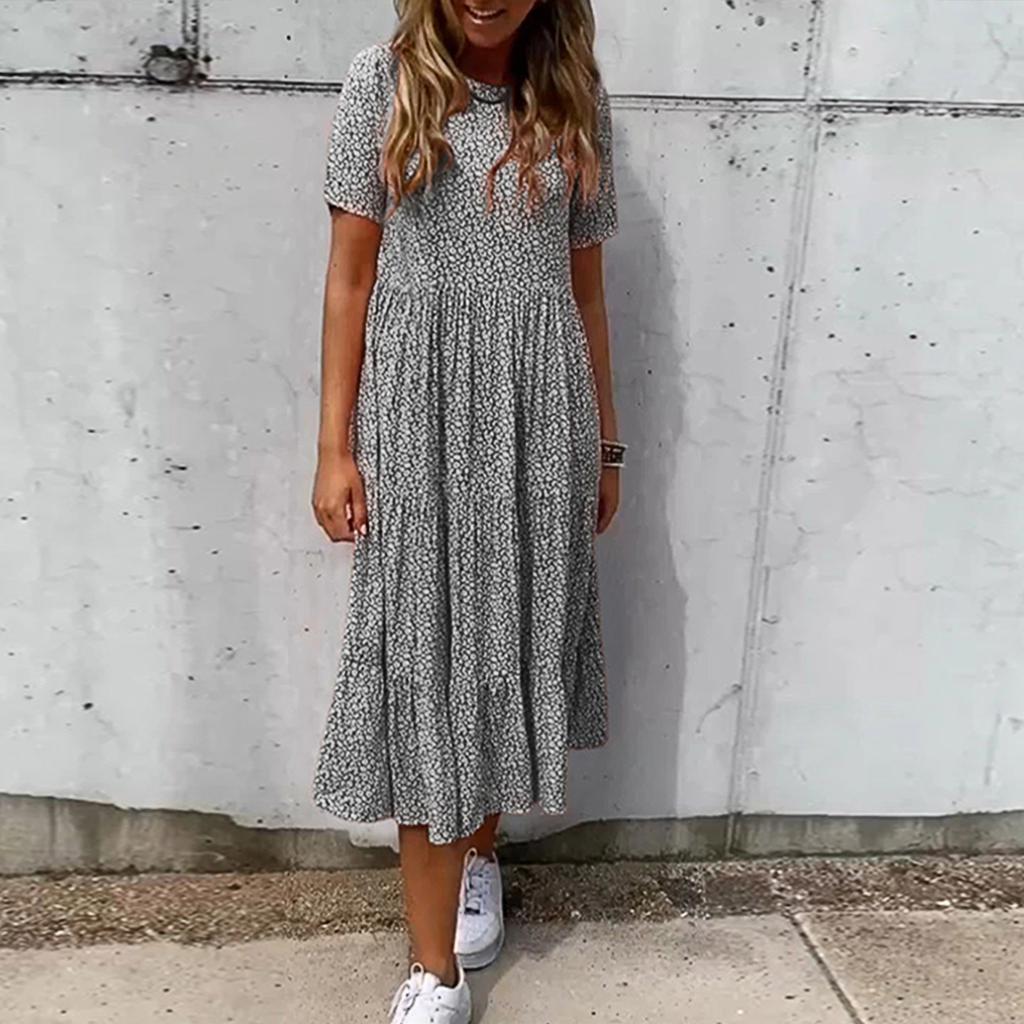 Modisches, lockeres und schönes Kleid mit Rundhalsausschnitt und Blumenmuster für Damen