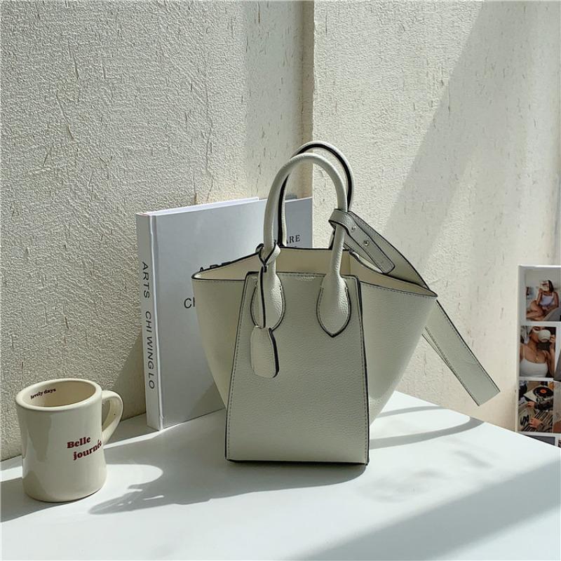 

Oblique span shoulder bag logo fashion popular wings handbag large capacity niche design bucket bag women білий