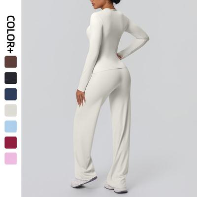 Conjunto de yoga transfronterizo: Top de manga larga Bare Feel y pantalones de pierna ancha de talle alto.