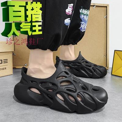 Sapatos com furos de tamanho grande masculinos 2025 verão novo tendência casal exterior respirável masculinos driving bag head chinelos