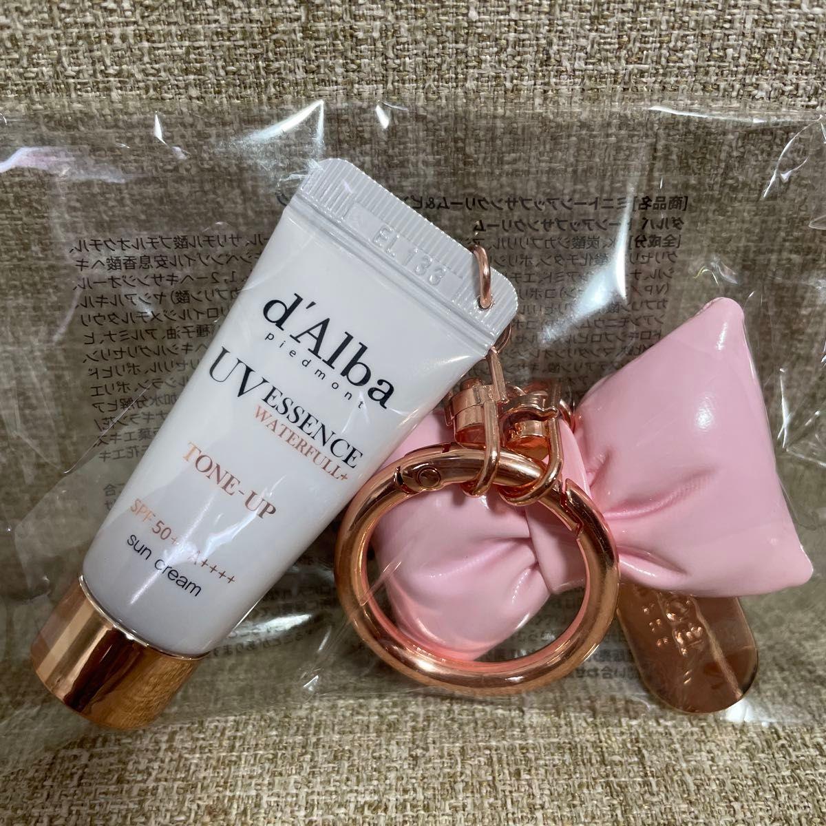 Brand new and unopened d Alba mini tone up sun cream & ribbon charm