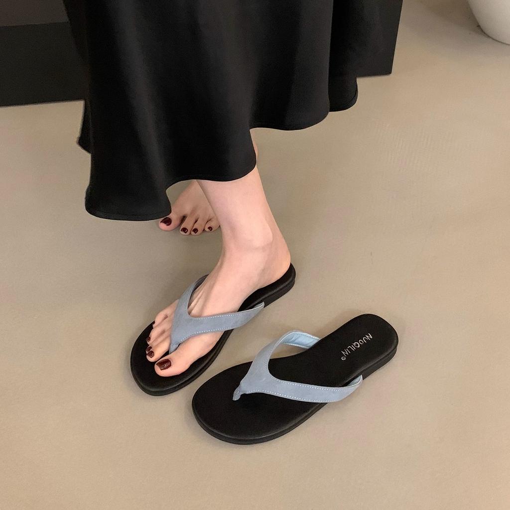 Franska minimalistiska tå sandaler för strandsemester nya sommar mångsidiga kontrasterande färg platta flip-flops damsandaler