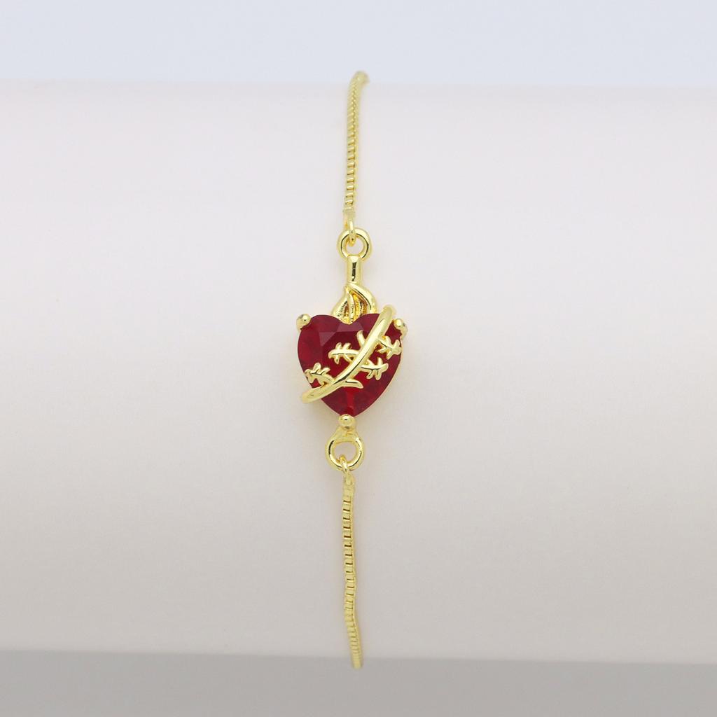 Herzförmige Liebe Kupferplattiertes Farbiges Zirkonium Pfirsichherz, Ein Schwert, das das Herz durchbohrt, kann das Zirkon-Box-Armband ziehen und verstellen.