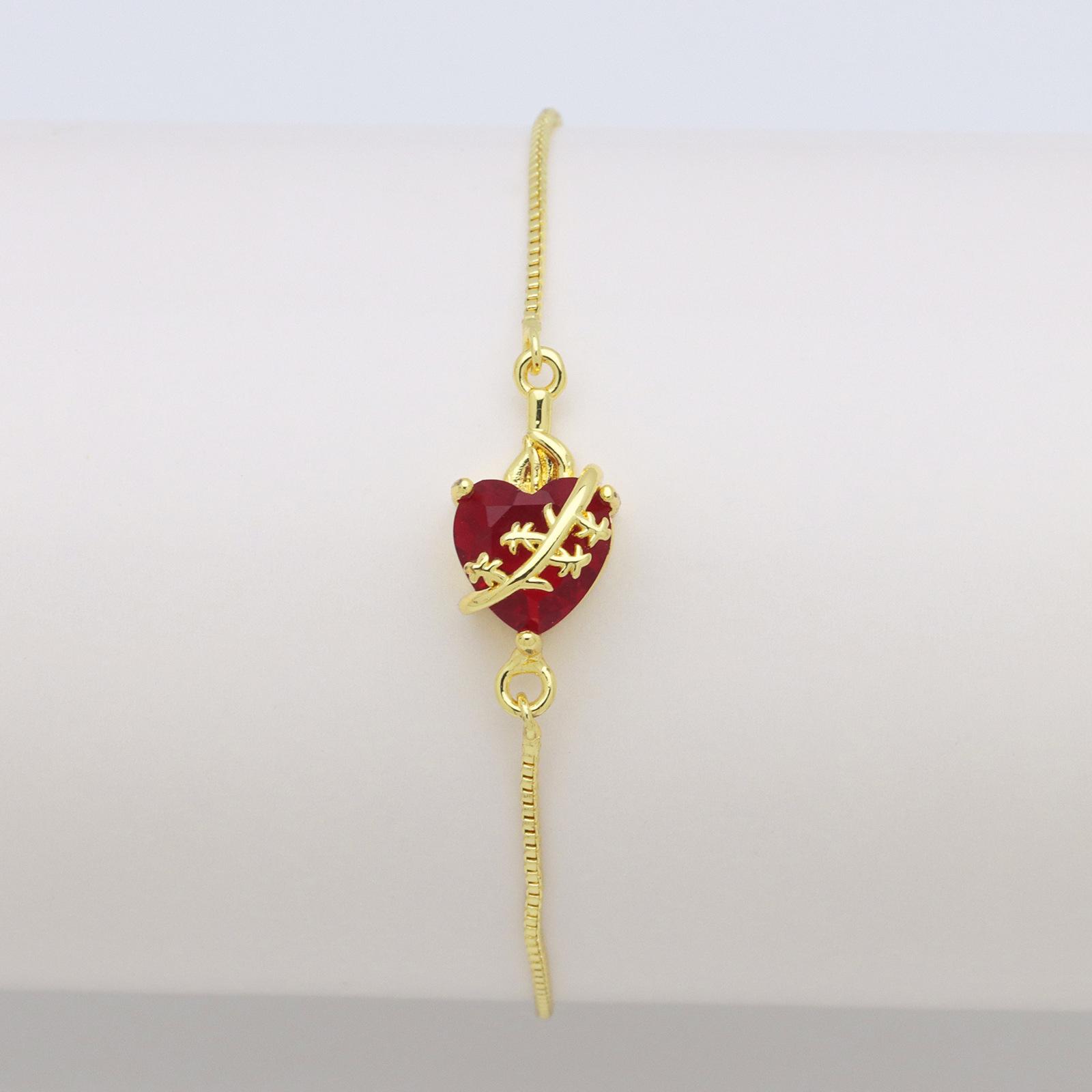 

Любовь в форме сердца Покрытое медью Цветной цирконий Персиковое сердце, Меч, пронзающий сердце, может тянуть и регулировать циркониевый браслет-коробку.