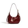 Premium patent leather glossy armpit bag 2025 new fashionable solid color portable crescent bag niche commuter shoulder bag