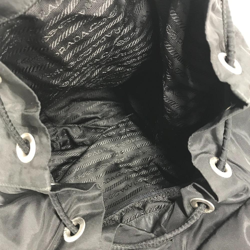 Prada Tasche mit dreieckiger Logo-Platte Rucksack Leder / Nylon Schwarz